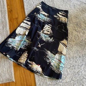 A-line knee length nautical skirt.